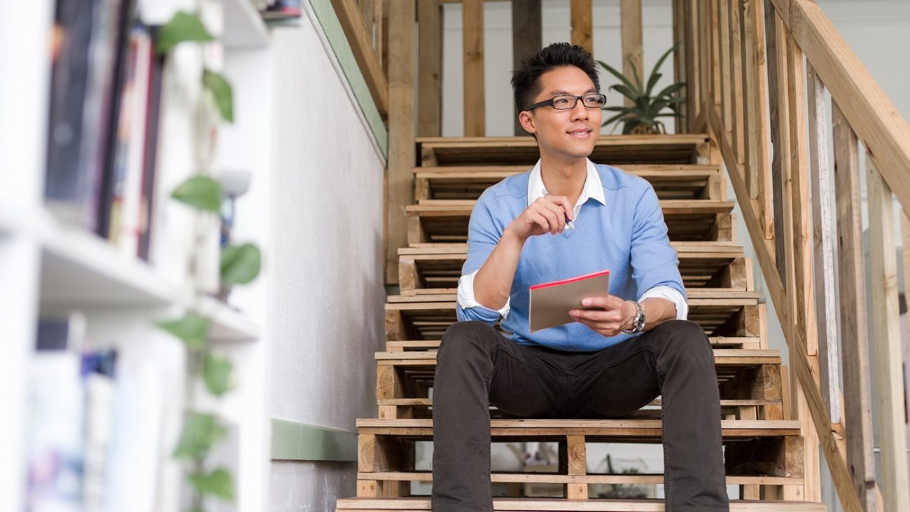 portrait-of-young-businessman-in-casual-P86QBSV
