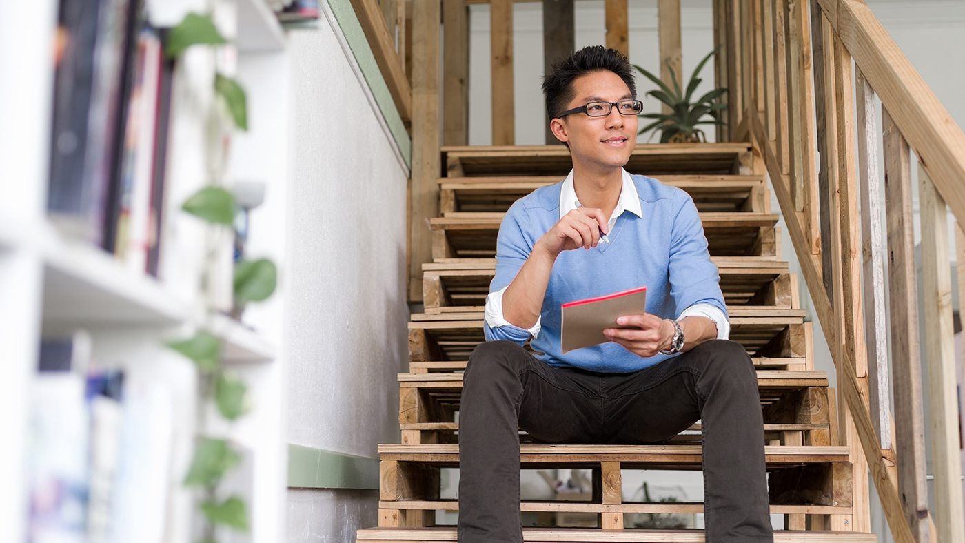 portrait-of-young-businessman-in-casual-P86QBSV