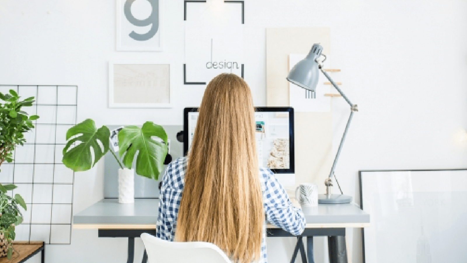 happy-lady-sitting-in-office-coworking-while-P5AFND8