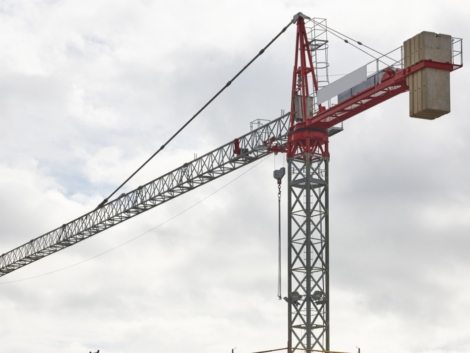 building-in-progress-and-crane-machinery-K37BCN8