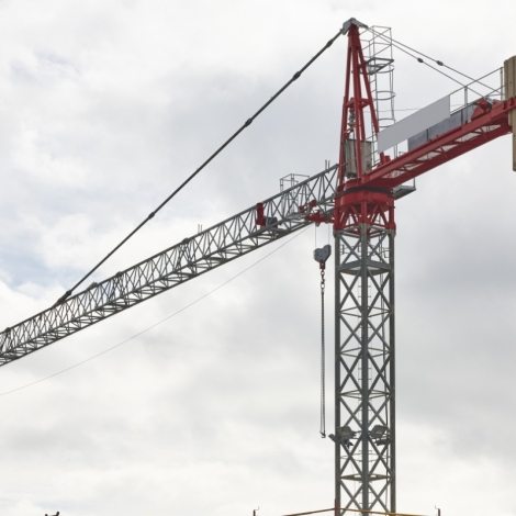 building-in-progress-and-crane-machinery-K37BCN8