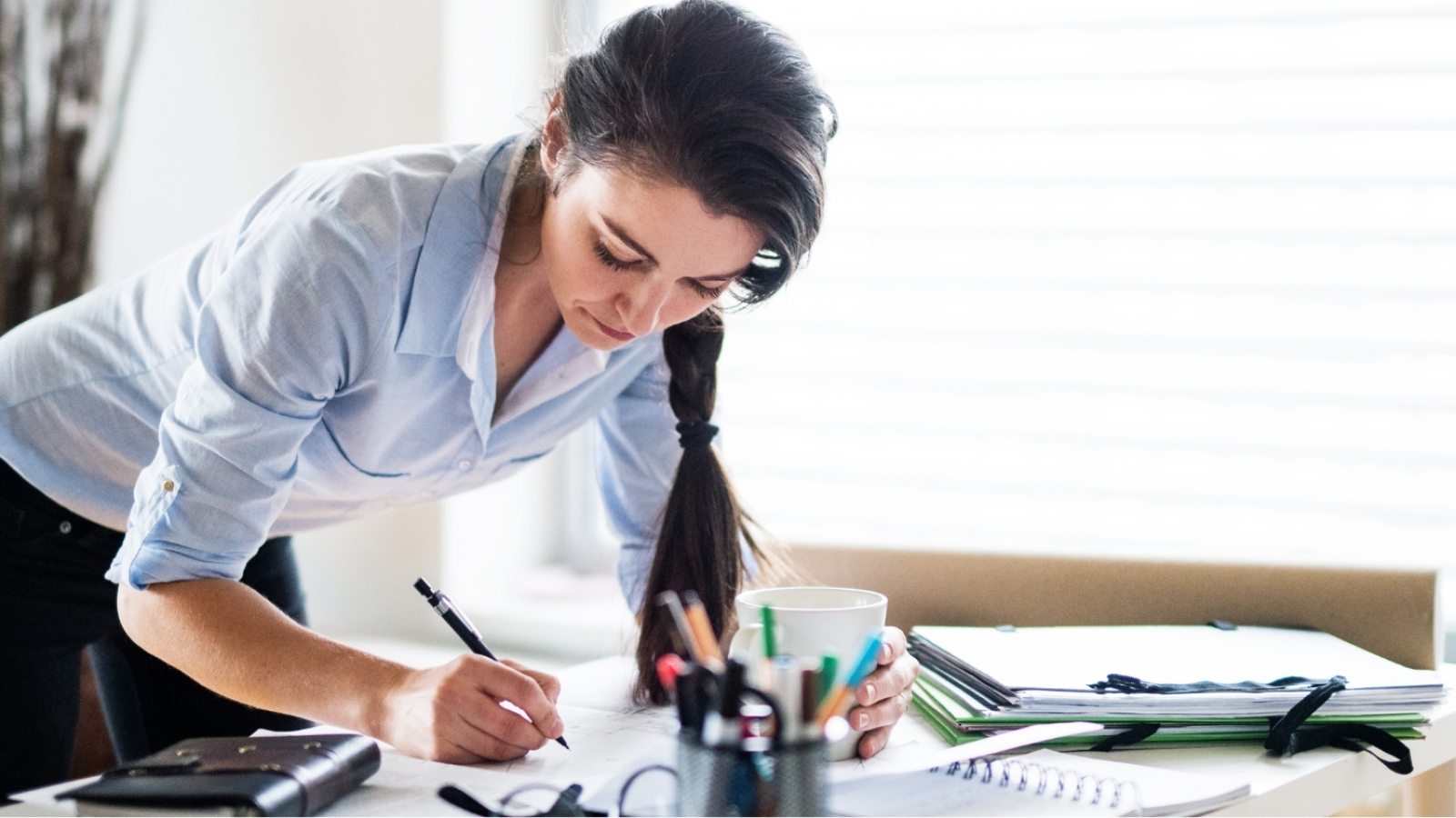 a-portrait-of-a-woman-working-at-home-PW6FL9X