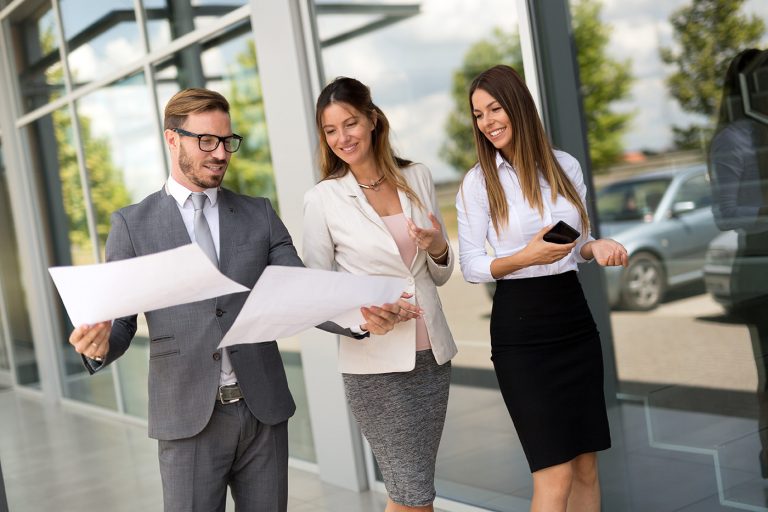 picture-of-business-people-discussing-in-their-P59UCWR