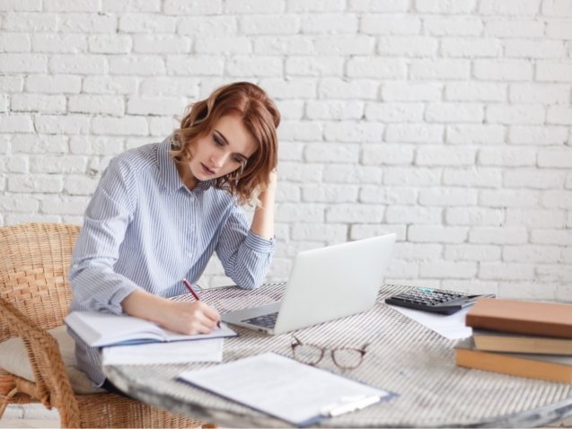 woman-freelancer-female-hands-with-pen-writing-on-P369BAX(1)
