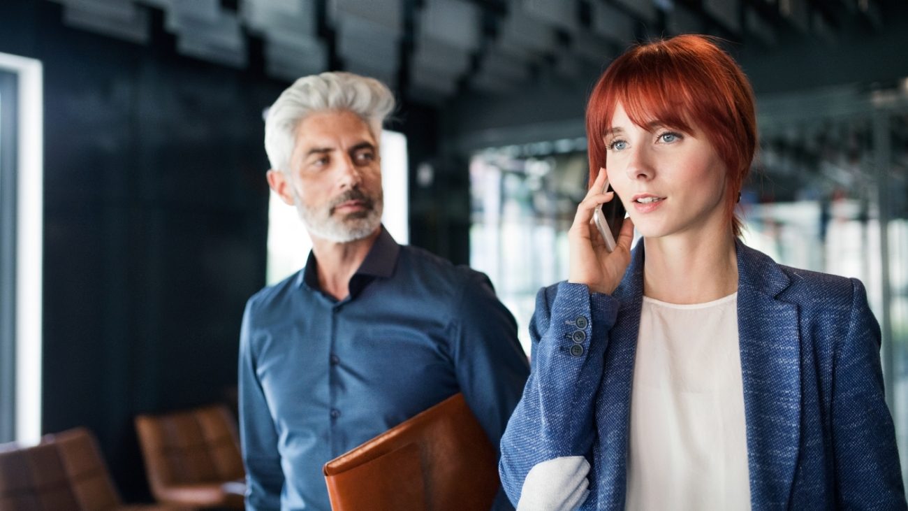 business-people-in-the-office-making-a-phone-call-PQZTHDY