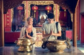 couple-ceremony-respect-praying-temple-concept-PXW7YWH