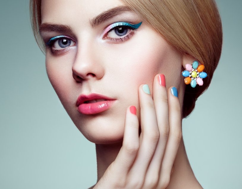 Portrait of beautiful sensual woman with elegant hairstyle.  Perfect makeup. Blonde girl. Fashion photo. Jewelry