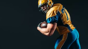 american-football-offensive-player-with-ball-P7XHT3R
