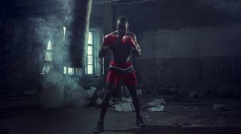 hand-of-boxer-over-black-background-strength-L7JXP4Q