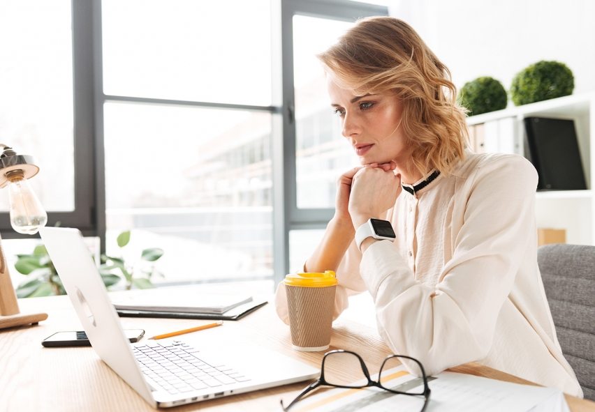 concentrated-serious-young-business-woman-PAM32VF