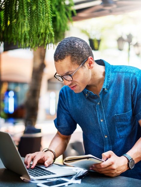 man-working-coffee-shop-connecting-laptop-concept-P3NTZ89
