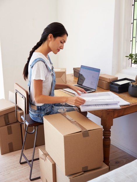 woman-running-business-from-home-working-on-PCZKTN9